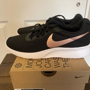 Nike Tanjun Women’s shoes. Brand new in box - never worn. Size 10.